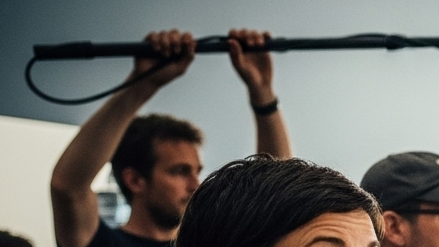 A freelancer using British sign language on set