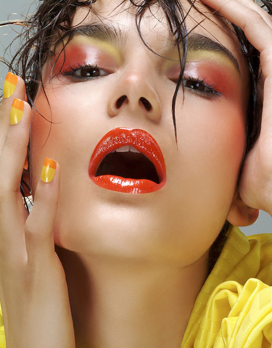 A photo from an editorial fashion shoot featuring a close-up of a woman in fashion make-up