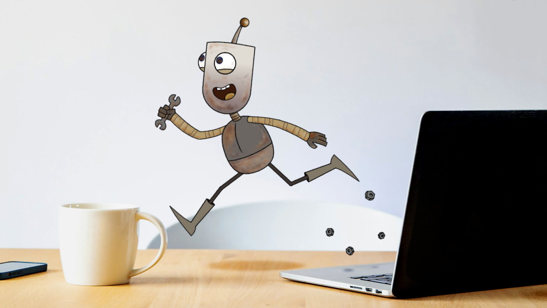 A small robot holding a wrench runs across a desktop with a laptop on the right and a coffee mug on the left