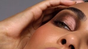 A close-up of a model and her makeup look