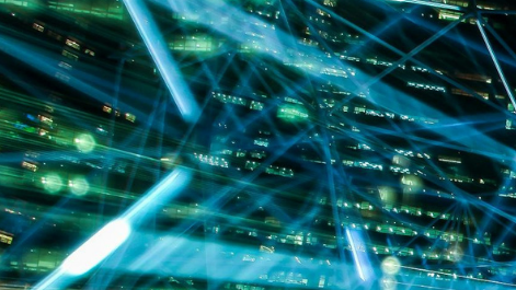 Futuristic blue circuit-board background. A brown banner runs at the bottom of the image with a picture of Angus Finney, the MediaXchange logo and title of the training course.
